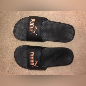 Black Puma Slides with Rose Gold lettering
